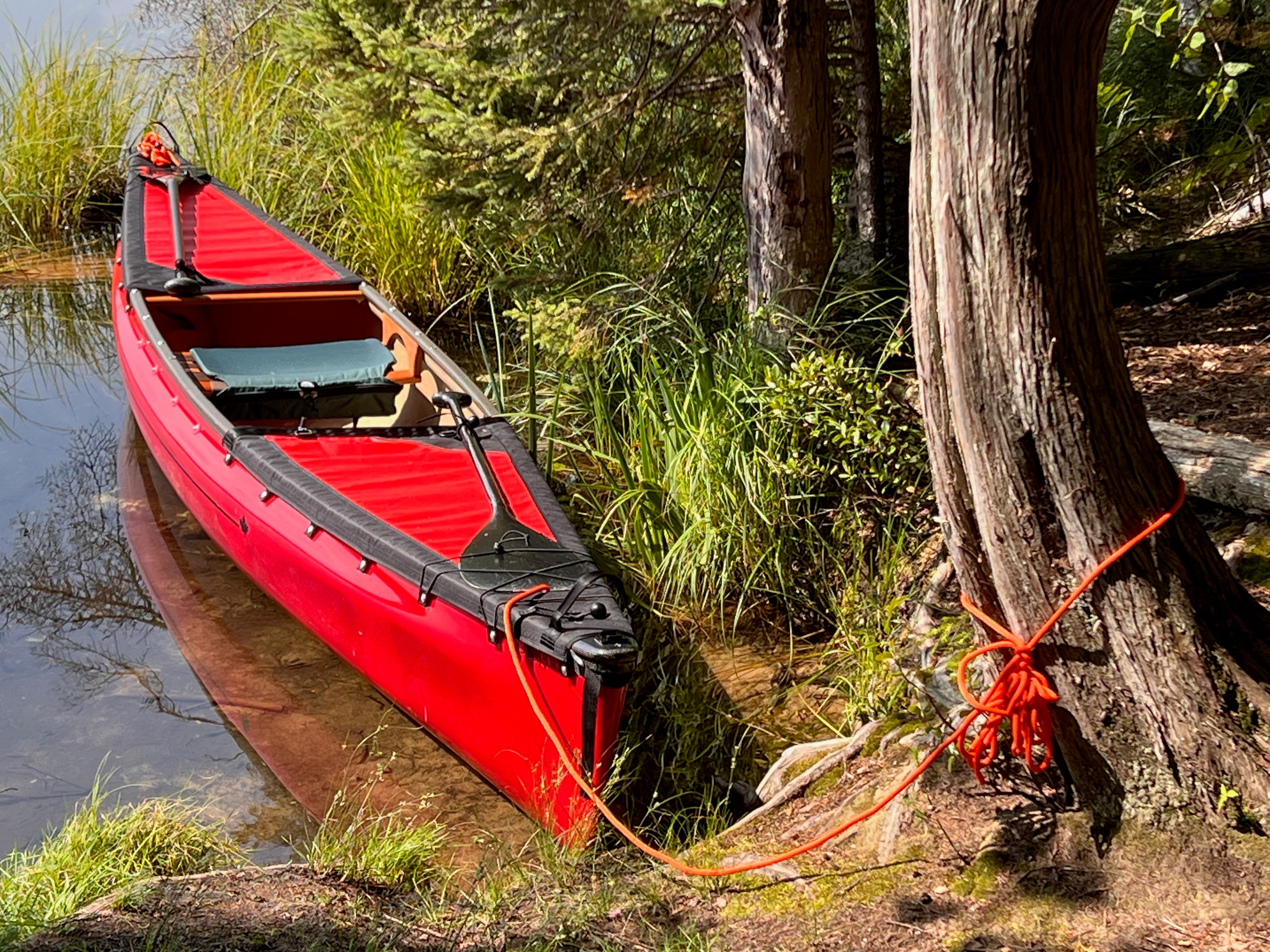 Close-up of spray deck construction showing tunnel, battens, and quick-release seam